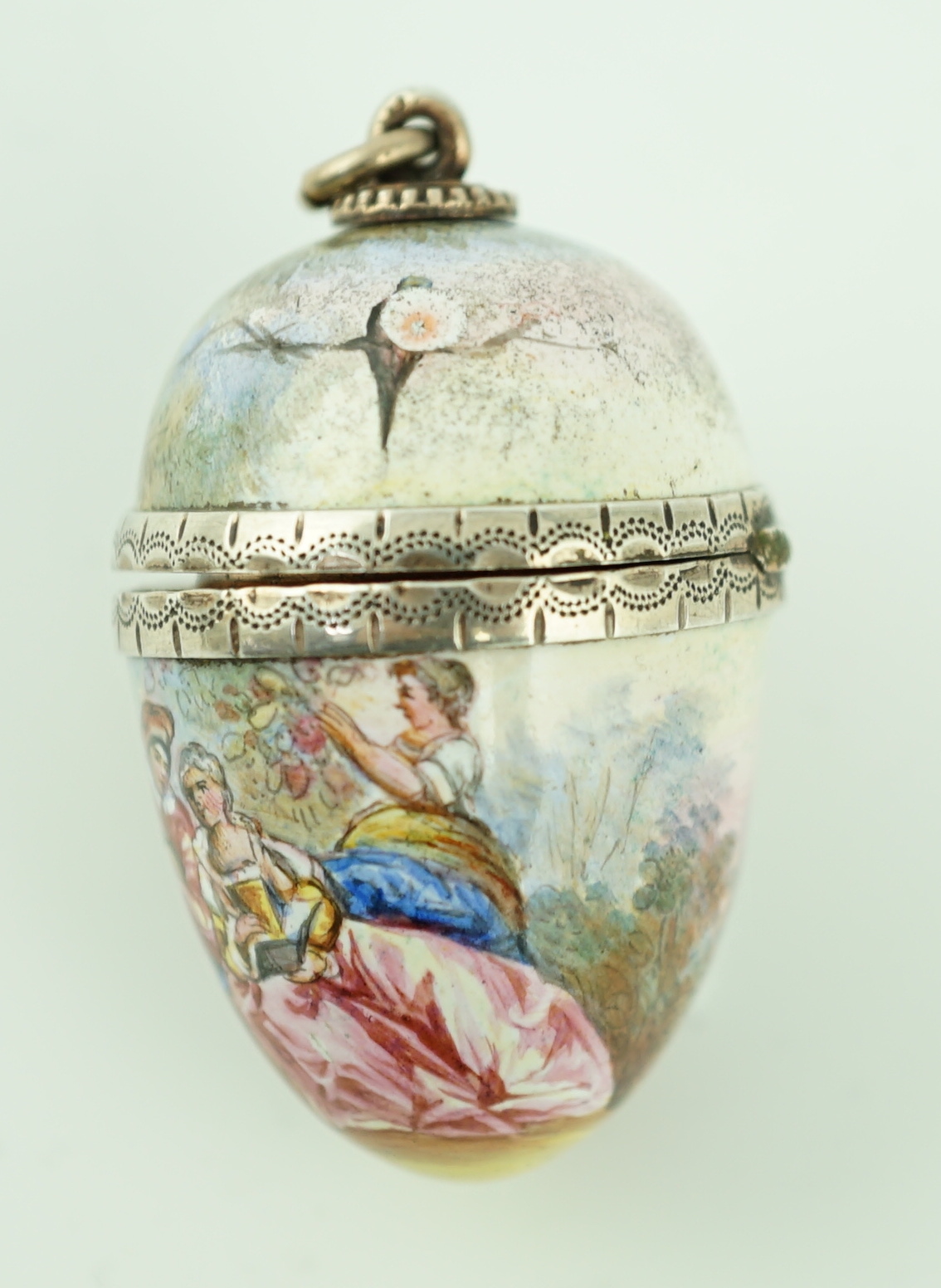 A 19th century Viennese? white and yellow metal mounted enamelled egg shaped vinaigrette, maker, Ludwig Politzer?